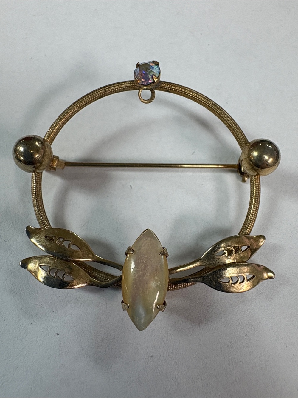 Gold-Tone Floral Circle Brooch with Marquise Opalescent Stone
